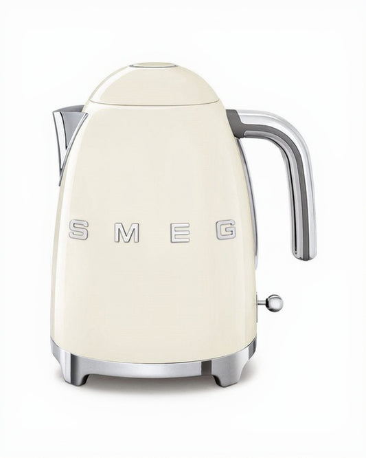 Cream-colored kettle with 'SMEG' branding on a white background